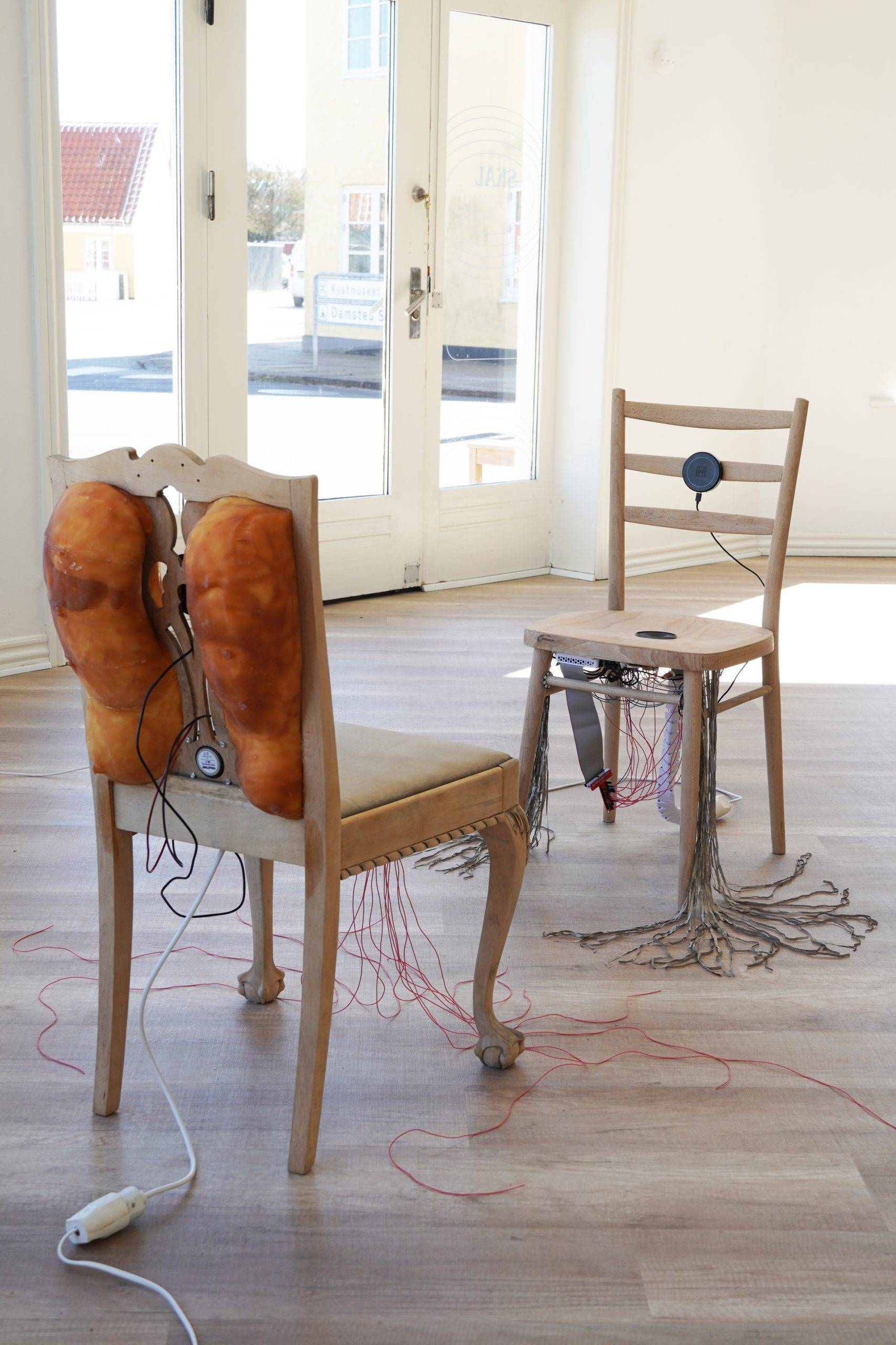 Sculptural chairs conversing about consciousness at SKAL Contemporary